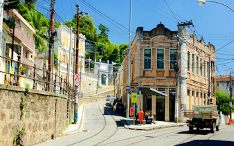 Santa Teresa street with tram tracks and historic buildings, Rio de Janeiro.