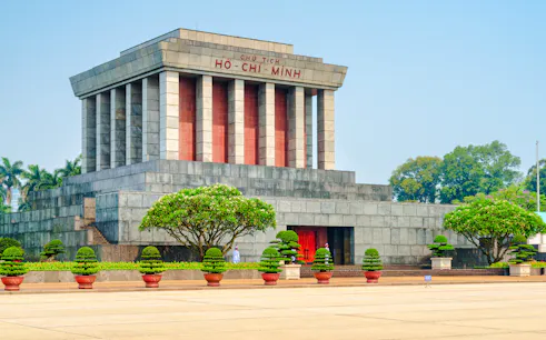 Ho Chi Minh Mausoleum in Hanoi with surrounding gardens.