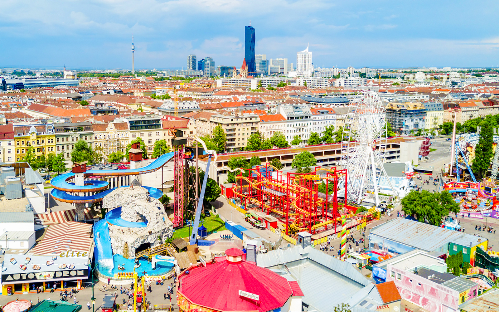 Aerial view of Prater Park in Vienna showcasing the iconic Ferris wheel and lush green spaces.