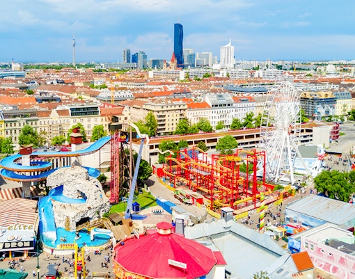 Aerial view of Prater Park in Vienna showcasing the iconic Ferris wheel and lush green spaces.