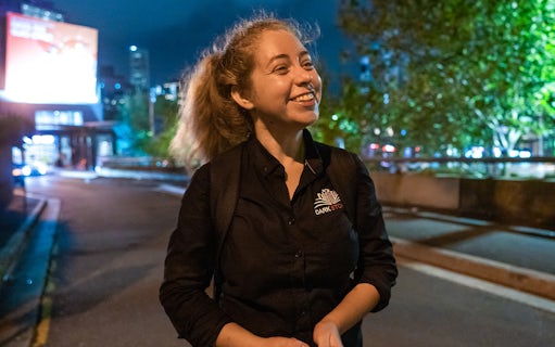 Tour guide leading Sydney's Razor Gang True Crime Tour at night.