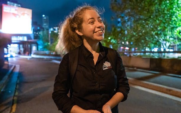 Tour guide leading Sydney's Razor Gang True Crime Tour at night.