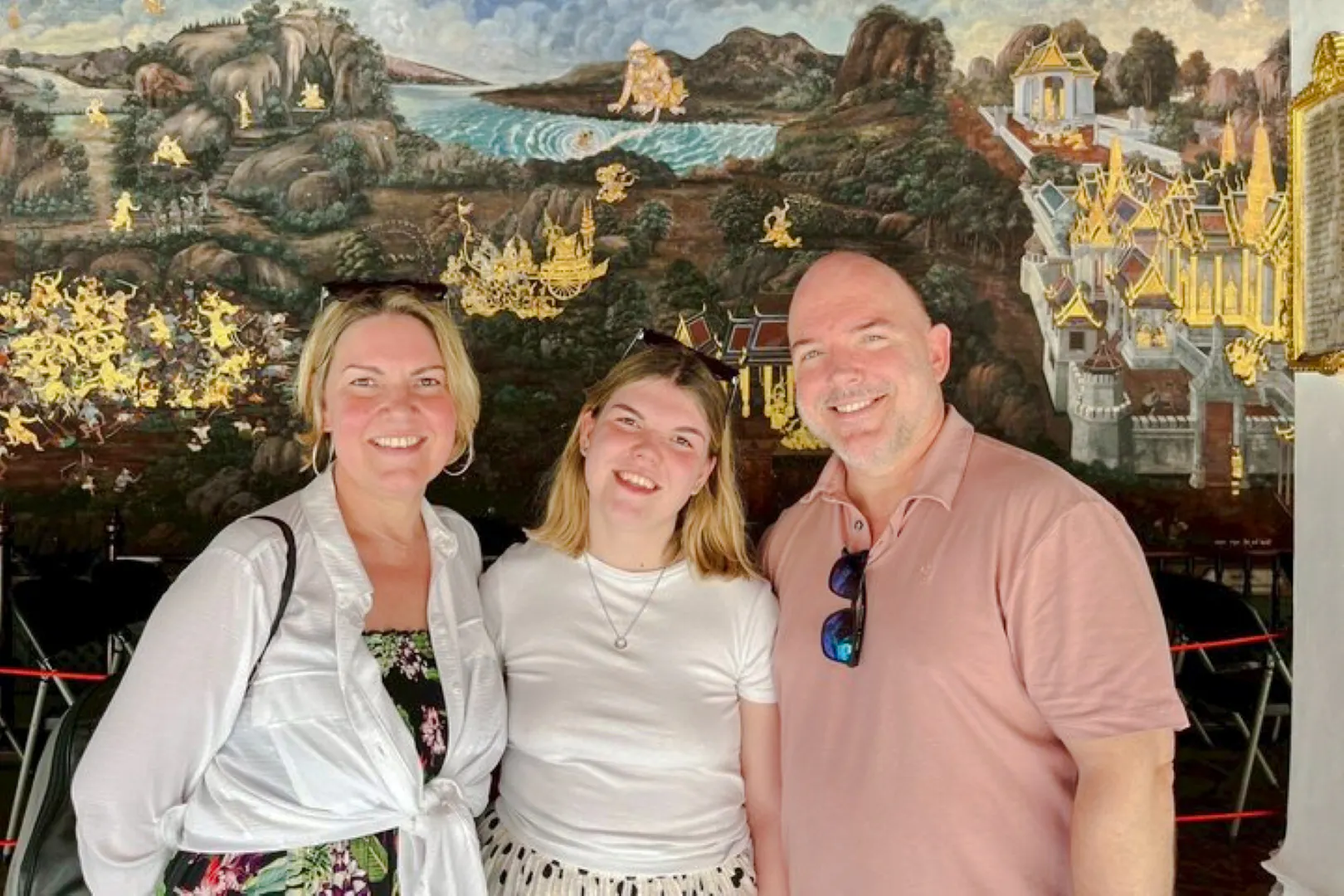 Visitors in front of a mural at the Grand Palace, Bangkok, during a private tour.