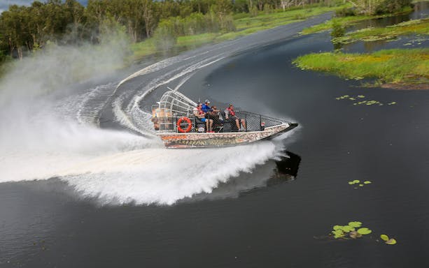 Airboat speeding on Finniss River during Top End Safari Camp tour from Darwin.