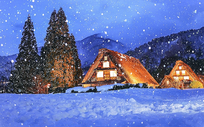 Traditional gassho-zukuri houses in snowy Shirakawa-go village, Japan.