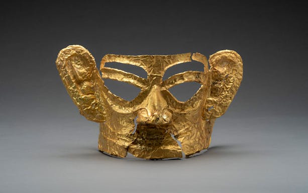 Golden mask artifact at Hong Kong Palace Museum.