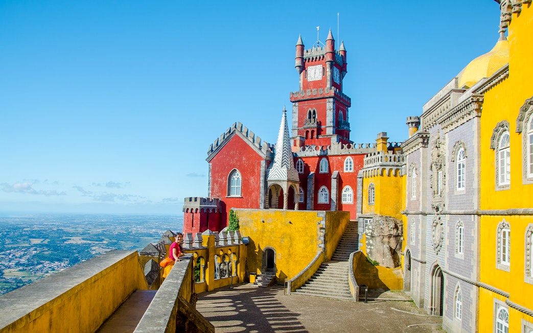 Pena Palace in Sintra, Portugal with colorful architecture and scenic views.
