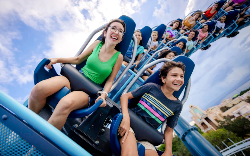 Riders enjoying the Penguin Trek coaster at SeaWorld Orlando.