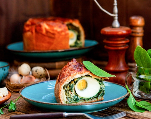 Torta Pasqualina savory spinach and ricotta tart with eggs, traditional Italian and Argentinian Easter dish.