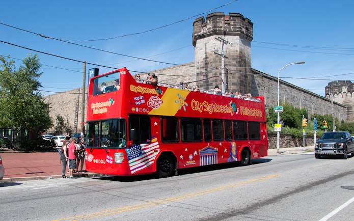 Open-top tour bus in front of Eastern State Penitentiary, Philadelphia.