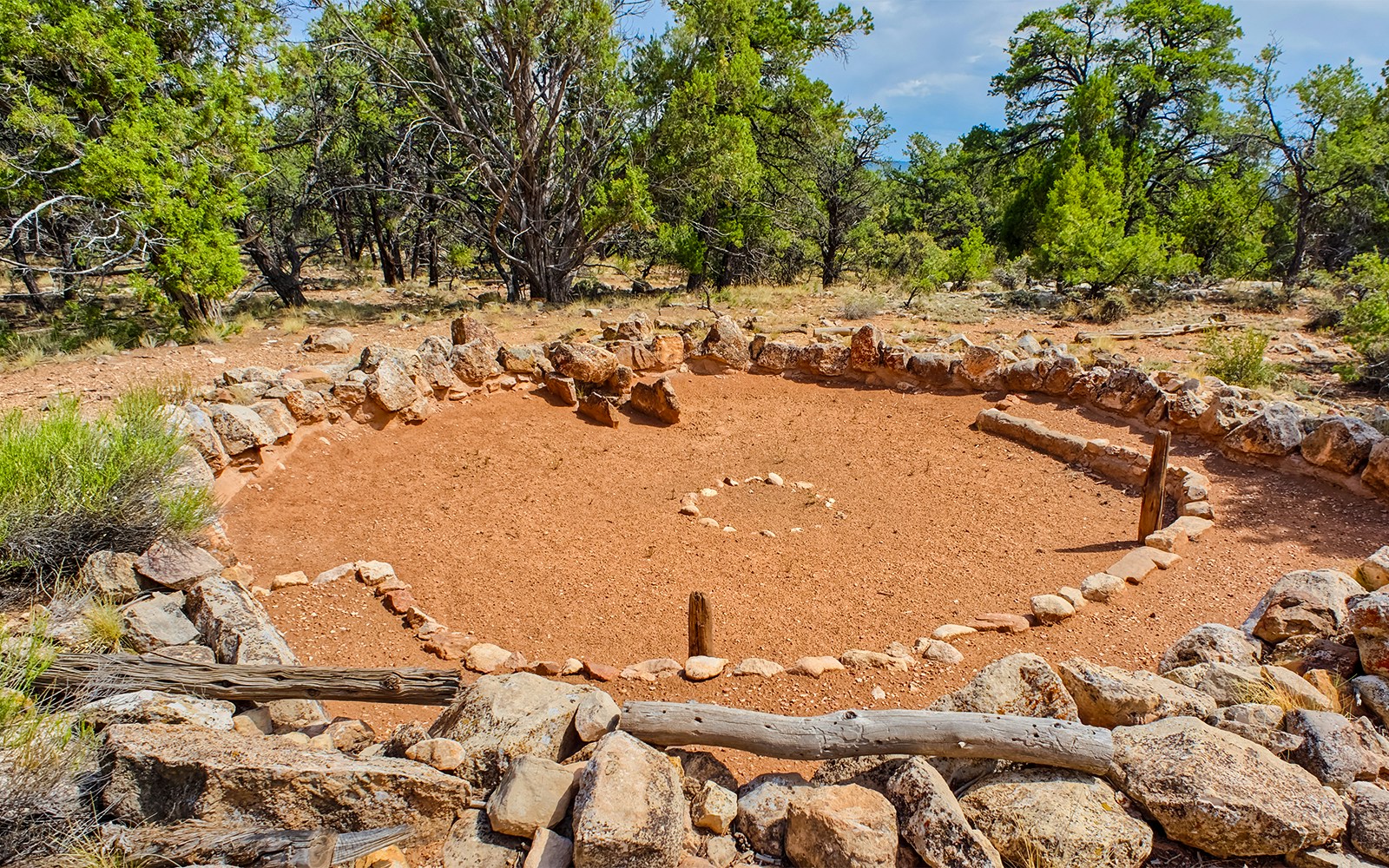 Tusayan Ruins at Grand Canyon, ancient stone structures surrounded by desert landscape, Arizona.