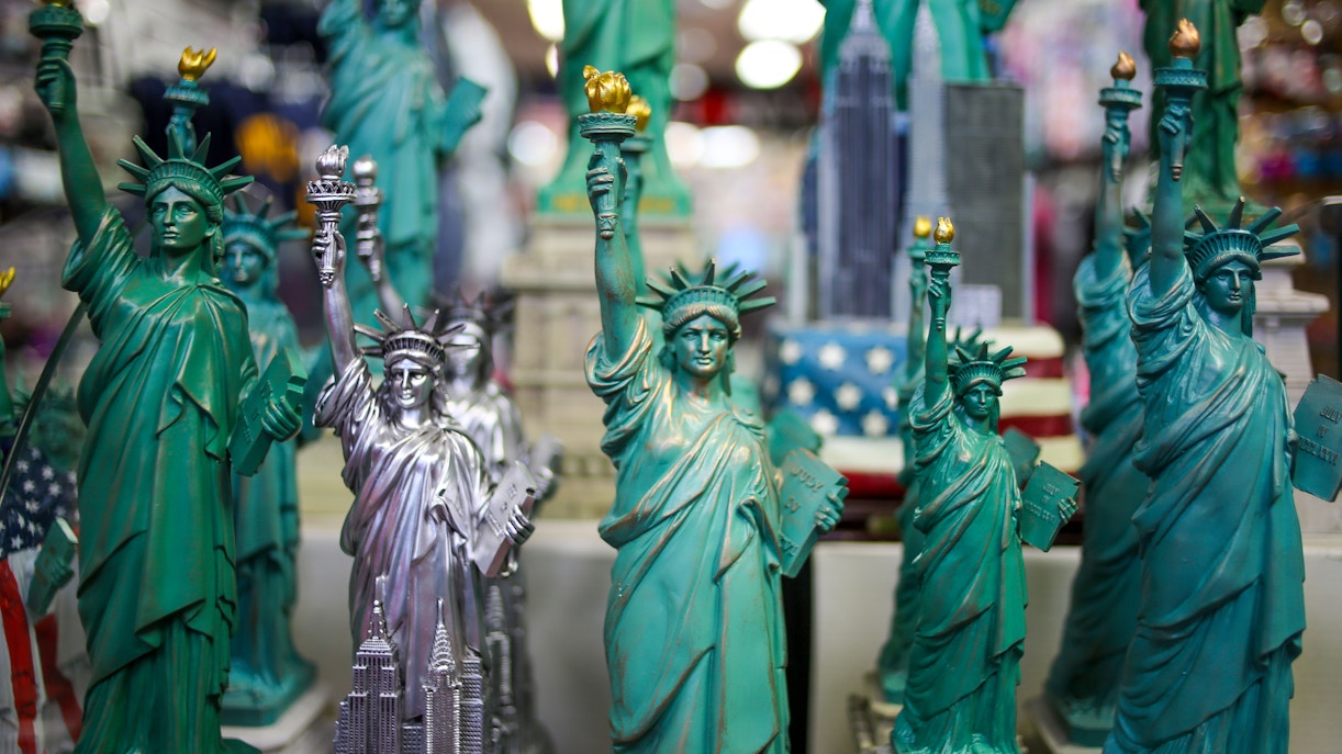 Statue of Liberty gift shop interior with souvenirs and memorabilia on display, New York City.