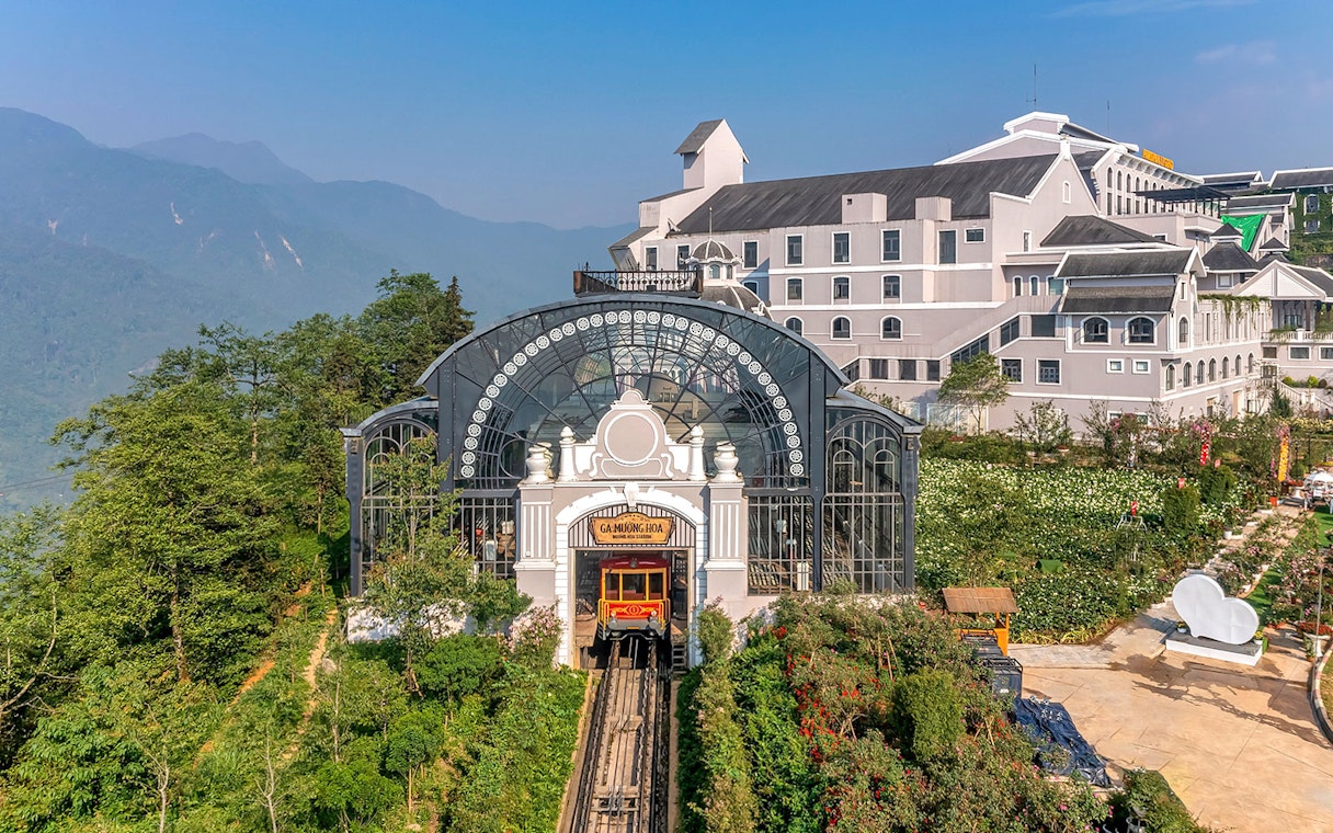 Sun World Fansipan Legend cable car station with mountain backdrop in Sapa, Vietnam.