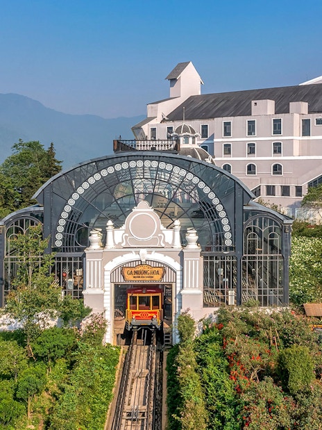 Sun World Fansipan Legend cable car station with mountain backdrop in Sapa, Vietnam.