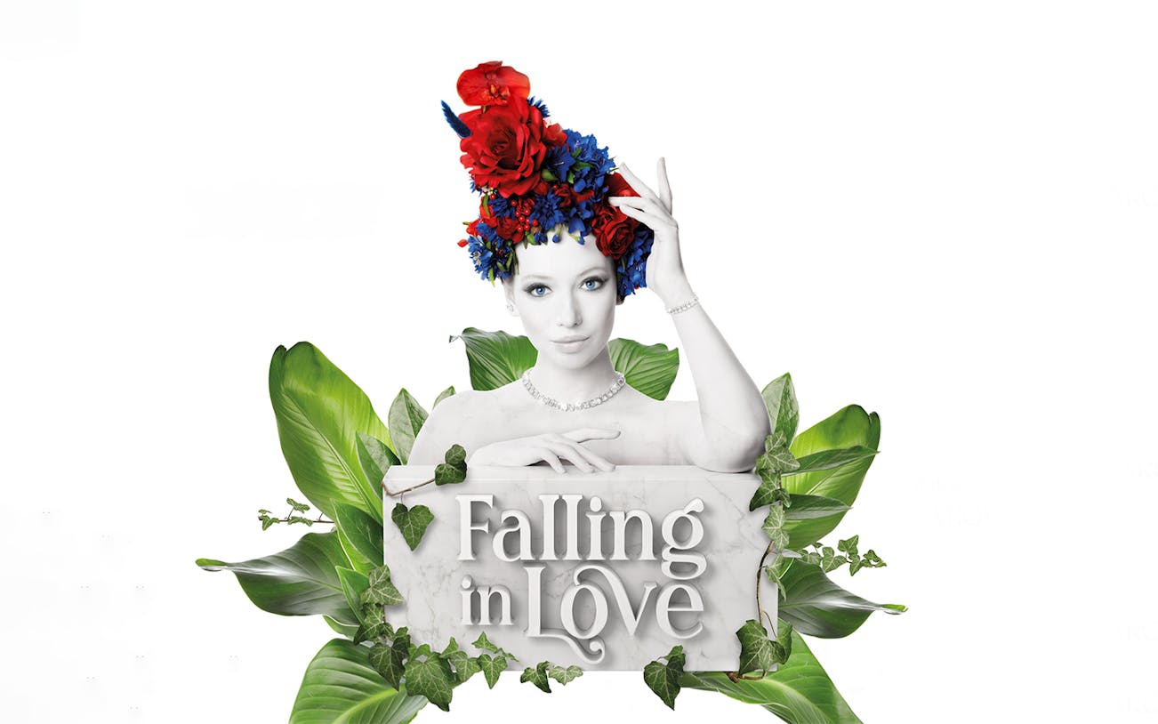 Performer with floral headpiece promoting FALLING | IN LOVE Grand Show.