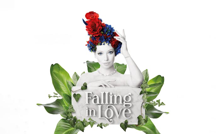 Performer with floral headpiece promoting FALLING | IN LOVE Grand Show.