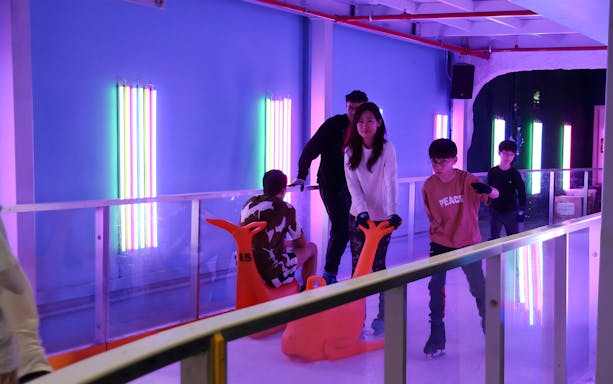 Ice skaters enjoying Blue Ice Snow Park at Pavilion Bukit Jalil.