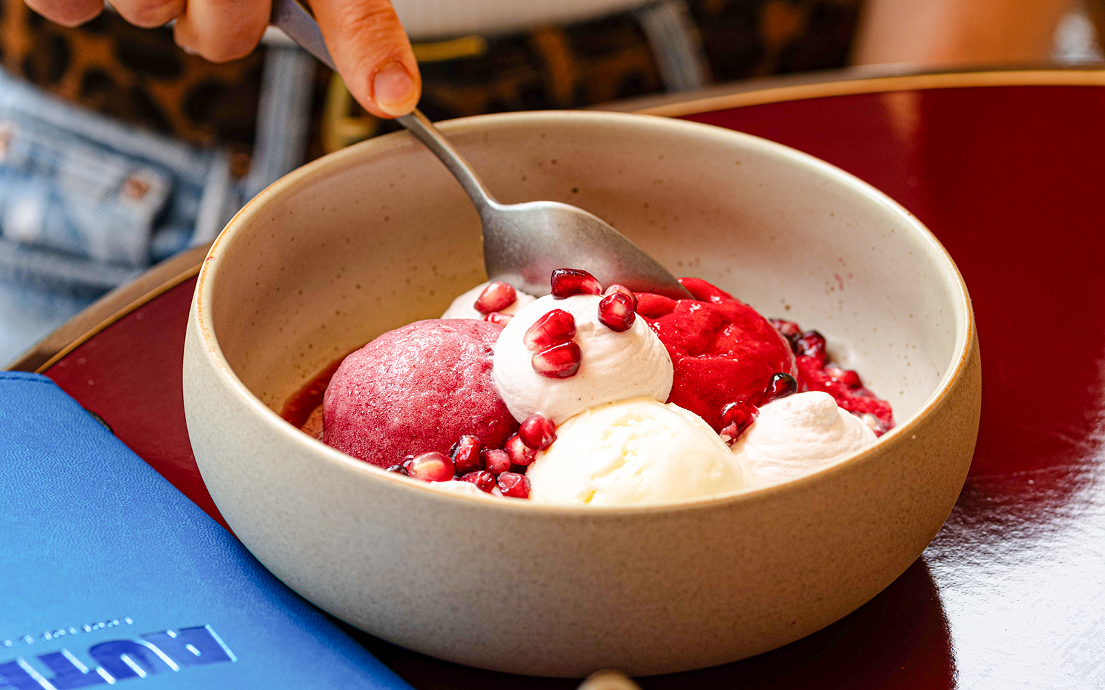 Sorbet and ice cream with pomegranate seeds at Brasserie Auteuil.