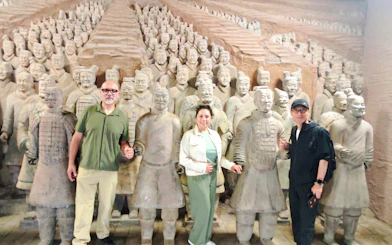 Visitors standing among Terracotta Warriors at the museum in Chengdu during a half-day group tour.