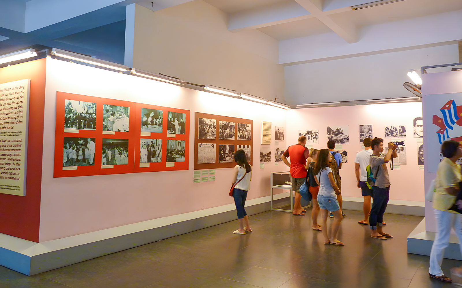 Tourists viewing exhibits at War History Museum, Ho Chi Minh City.
