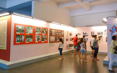 Tourists viewing exhibits at War History Museum, Ho Chi Minh City.