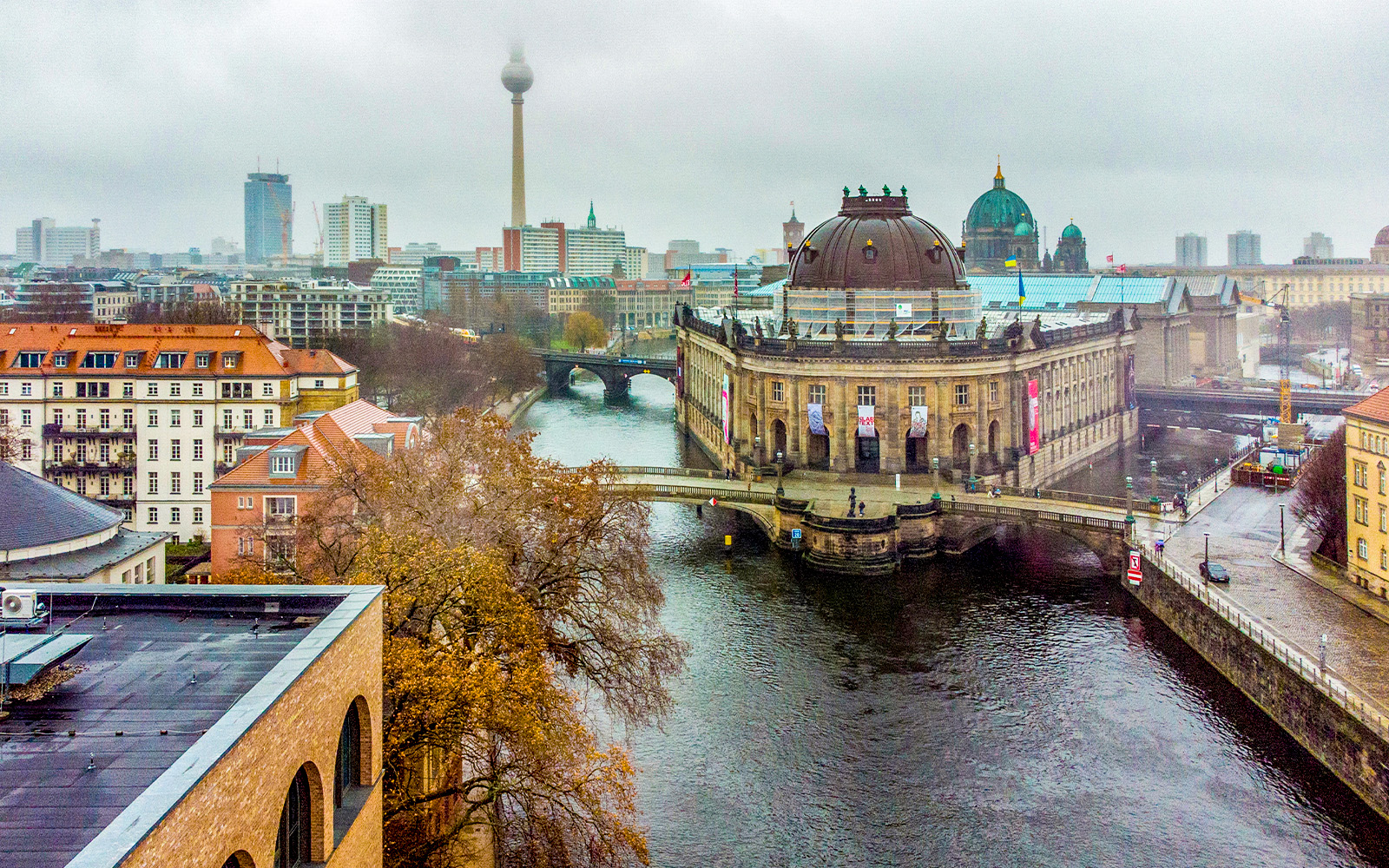 Aerial view of Bode-Museum, Spree River, and Fernsehturm in Berlin, Germany.