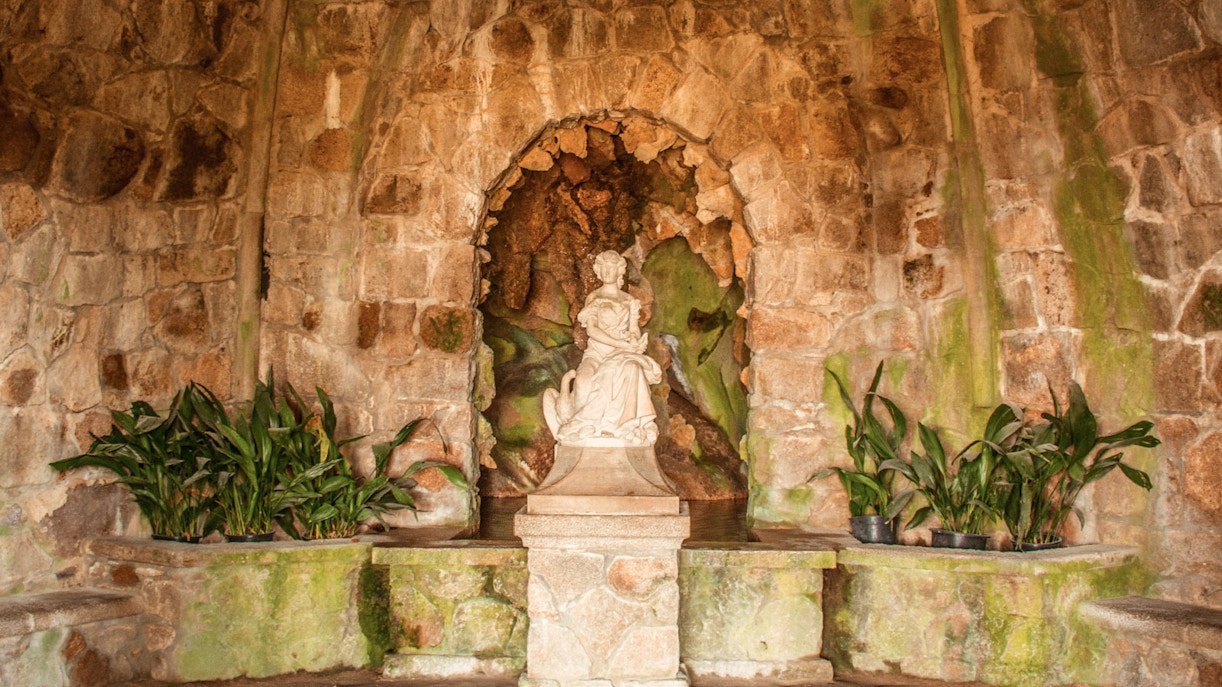 Leda's Grotto with intricate stone carvings at Quinta da Regaleira, Sintra, Portugal.