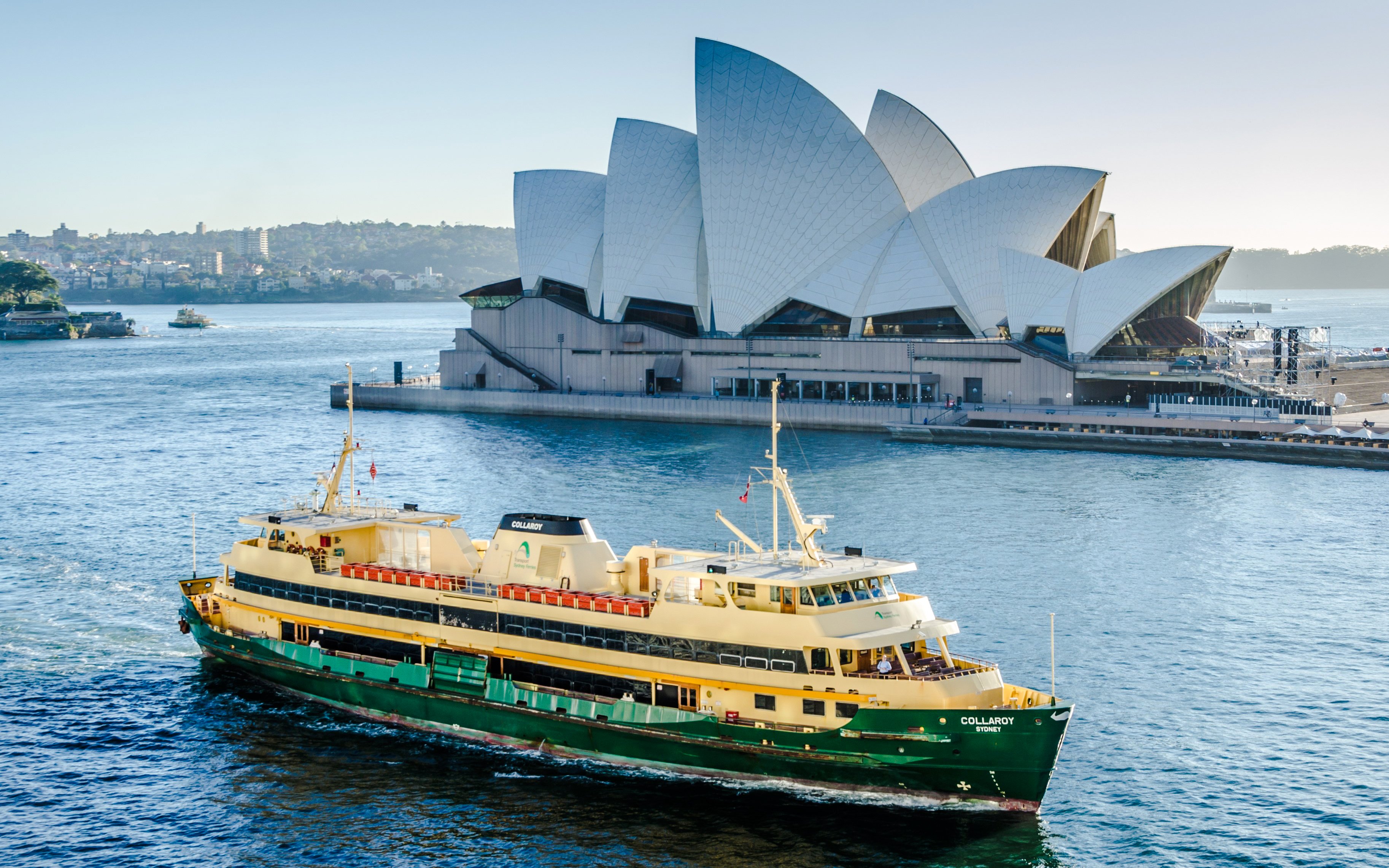 Sydney Harbour ferry near Opera House, part of Blue Mountains Zig Zag Train and Harbour Cruise tour.