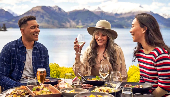 People enjoying lunch at Walter Peak High Country Farm