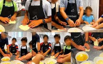 Participants shaping dough during a Tangier Moroccan cooking class on an organic farm.