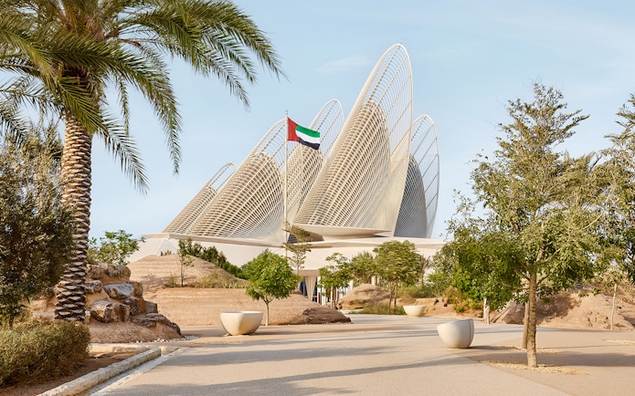 Exterior view of Zayed National Museum with unique architectural design in Abu Dhabi.