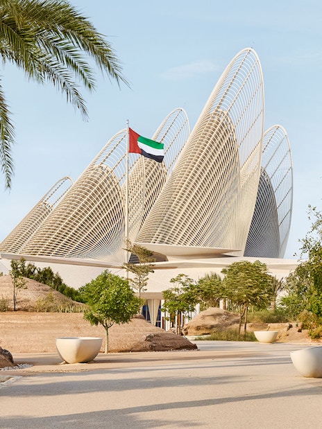 Exterior view of Zayed National Museum with unique architectural design in Abu Dhabi.