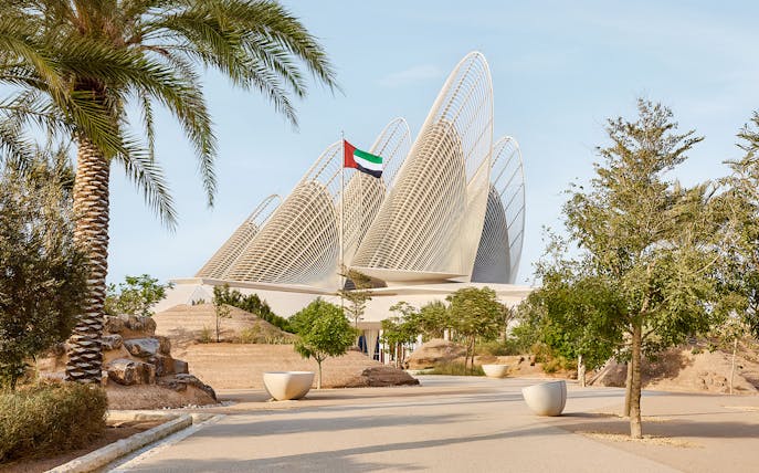 Exterior view of Zayed National Museum with unique architectural design in Abu Dhabi.