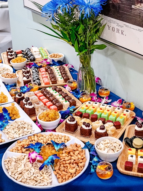 Assorted desserts and nuts on a table for New Year's Eve Dinner Cruise.