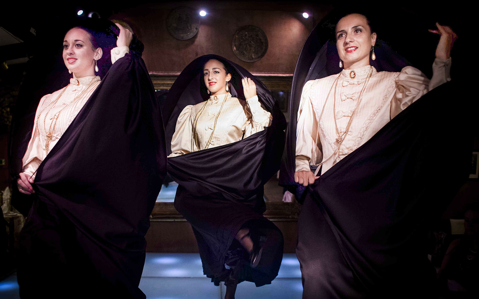 Performers in traditional Maltese attire during a folklore show.