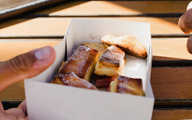 Portuguese pastries in a box during the Original Porto Petiscos Crawl.