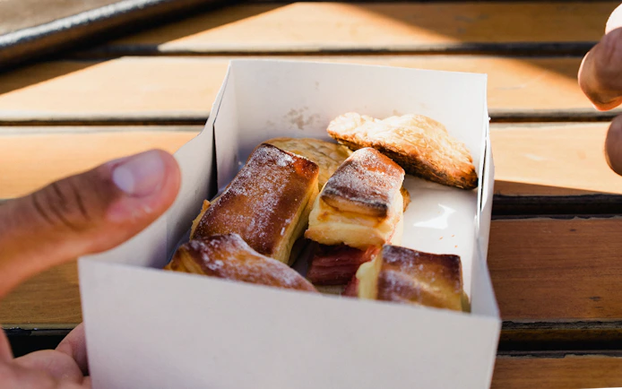 Portuguese pastries in a box during the Original Porto Petiscos Crawl.