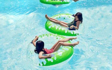 Children enjoying water tubes at Splash Works, Canada's Wonderland.