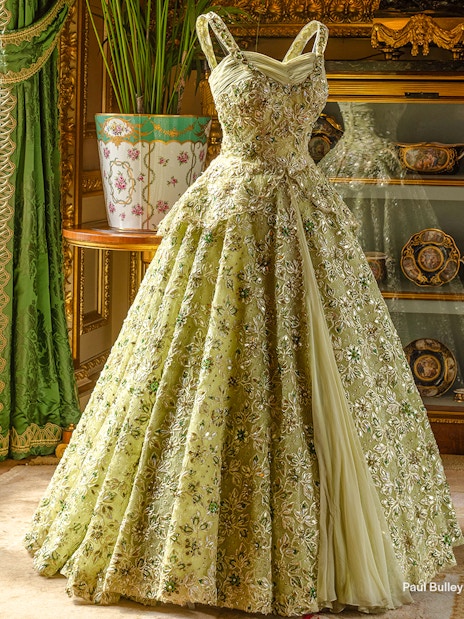 Elegant gown displayed in the Green Drawing Room at Windsor Castle.