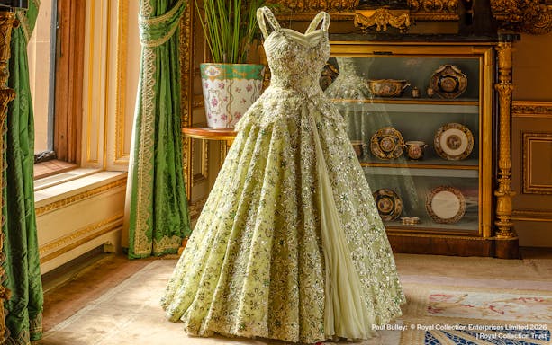 Elegant gown displayed in the Green Drawing Room at Windsor Castle.