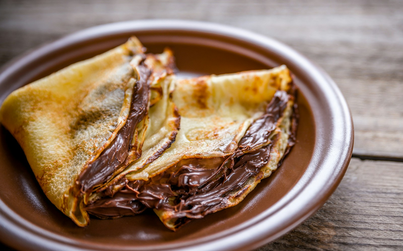 Crepes drizzled with chocolate cream