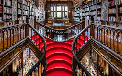 Livraria Lello's ornate staircase and bookshelves, Porto.