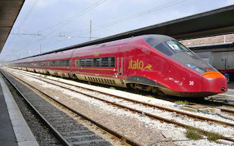 Italo train stationed at a platform in Italy.