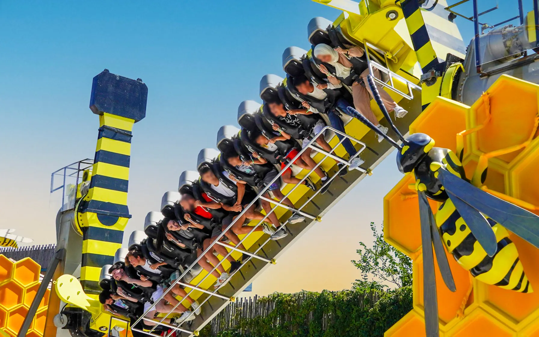 Roller coaster ride at Vialand Theme Park, Istanbul with bee-themed design.