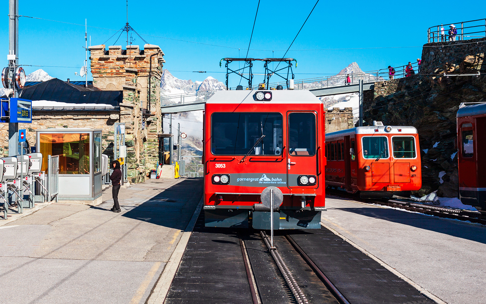 https://cdn-imgix.headout.com/media/images/027e56234c0e7c5c6834f94dbe2bbe79-Gornergrat%20Railway%20station.jpg