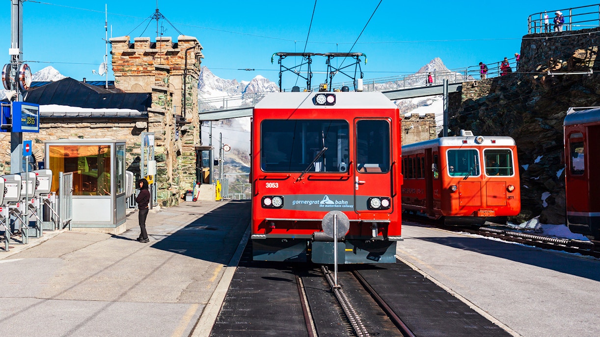 https://cdn-imgix.headout.com/media/images/027e56234c0e7c5c6834f94dbe2bbe79-Gornergrat%20Railway%20station.jpg