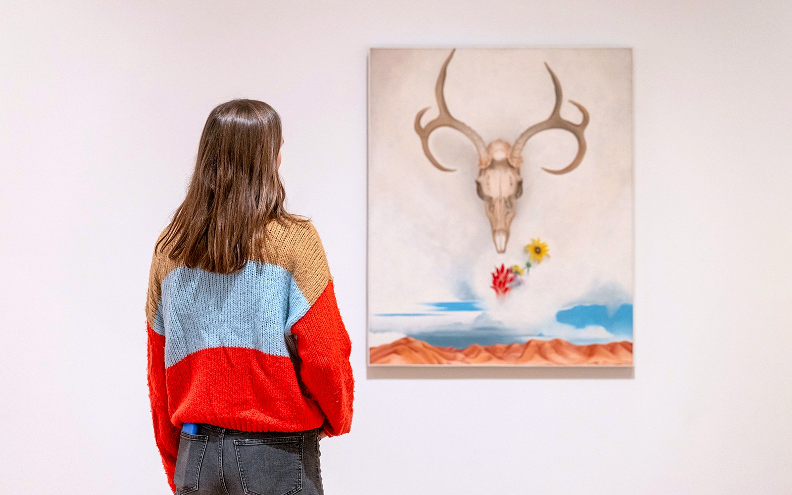 Guest viewing "Summer Days" by Georgia O'Keeffe at Whitney Museum of American Art.