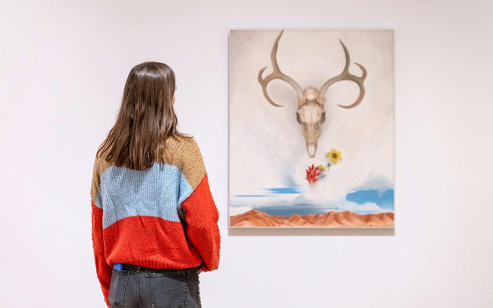 Guest viewing "Summer Days" by Georgia O'Keeffe at Whitney Museum of American Art.