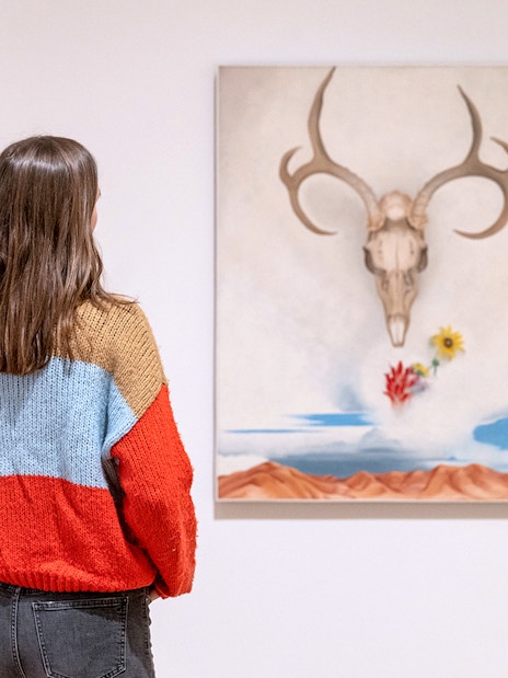 Guest viewing "Summer Days" by Georgia O'Keeffe at Whitney Museum of American Art.