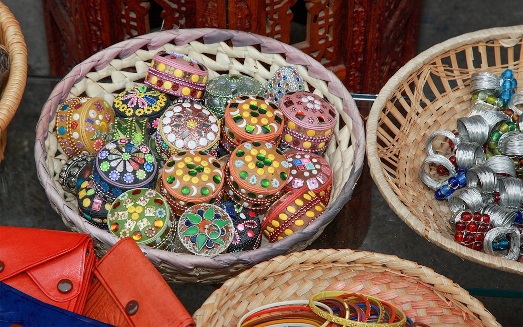 Colorful handcrafted boxes and jewelry at Granada's Silk Market.